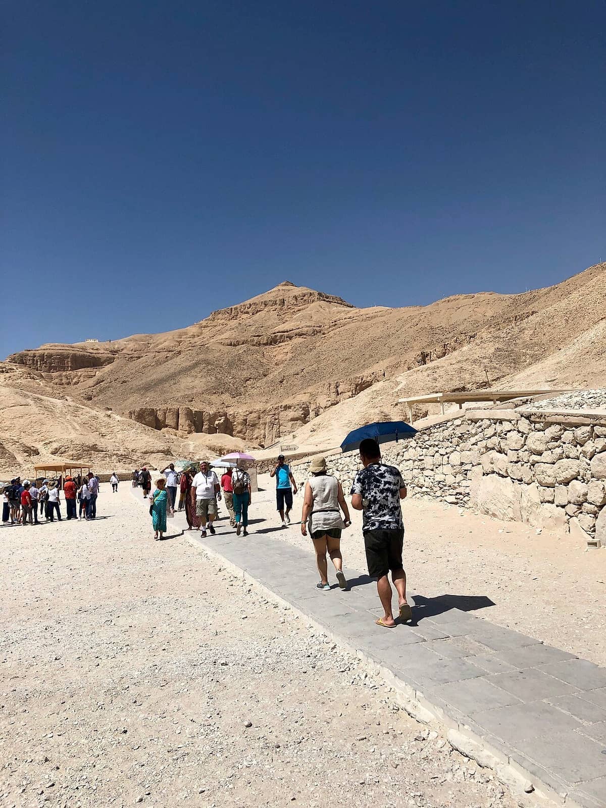 Wide desert view of the Valley of the Kings near Luxor, Egypt