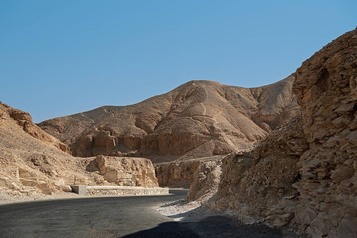 Limestone cliffs and desert floor of the Valley of the Kings near Luxor, Egypt