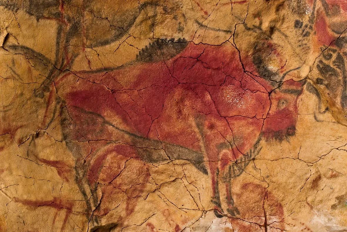 Polychrome painted bison on the ceiling of Altamira Cave, Cantabria, Spain, created c. 14,000–16,500 years ago