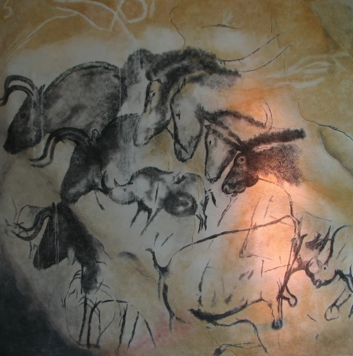 Prehistoric paintings of cave lions on the wall of Chauvet Cave, Ardèche, France, dated to c. 36,000 years ago