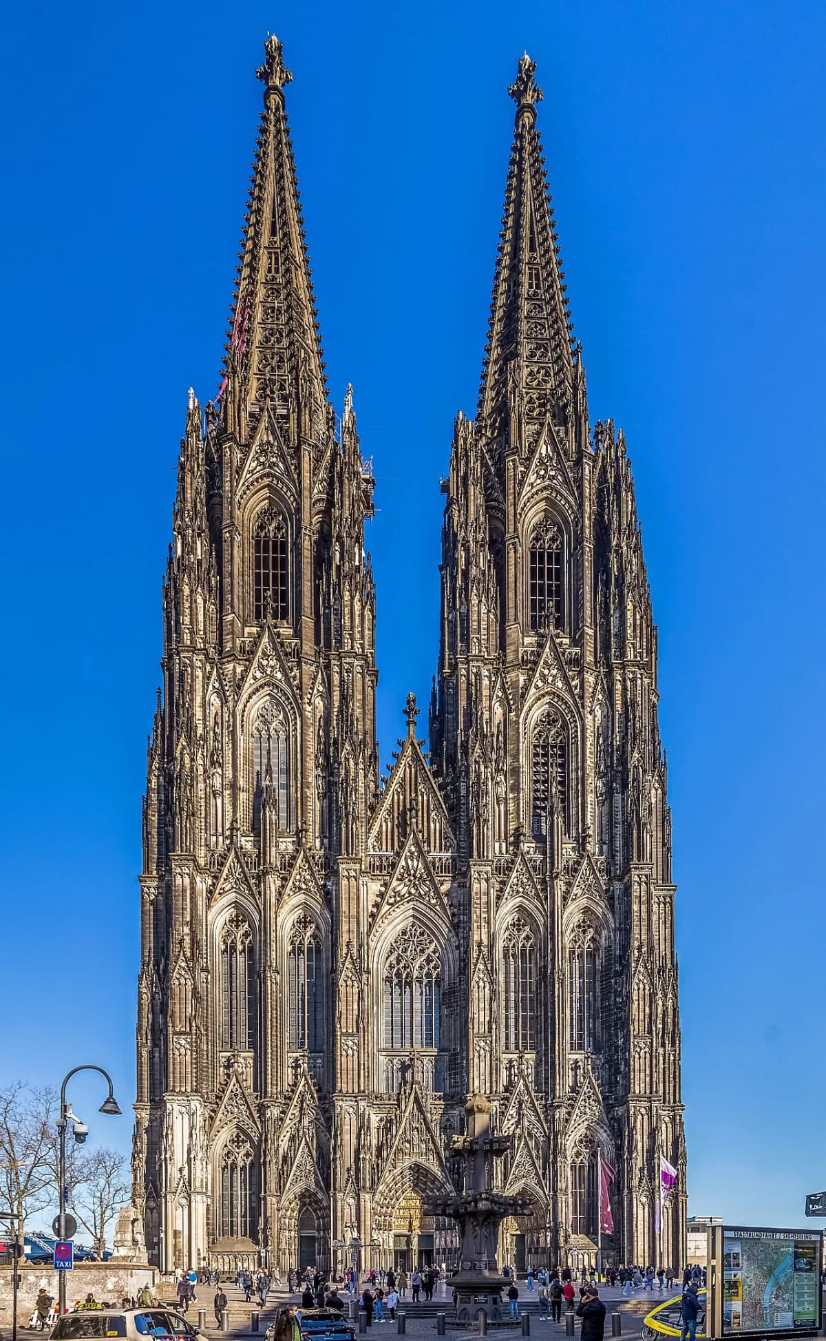 The twin Gothic spires and west façade of Cologne Cathedral, Germany