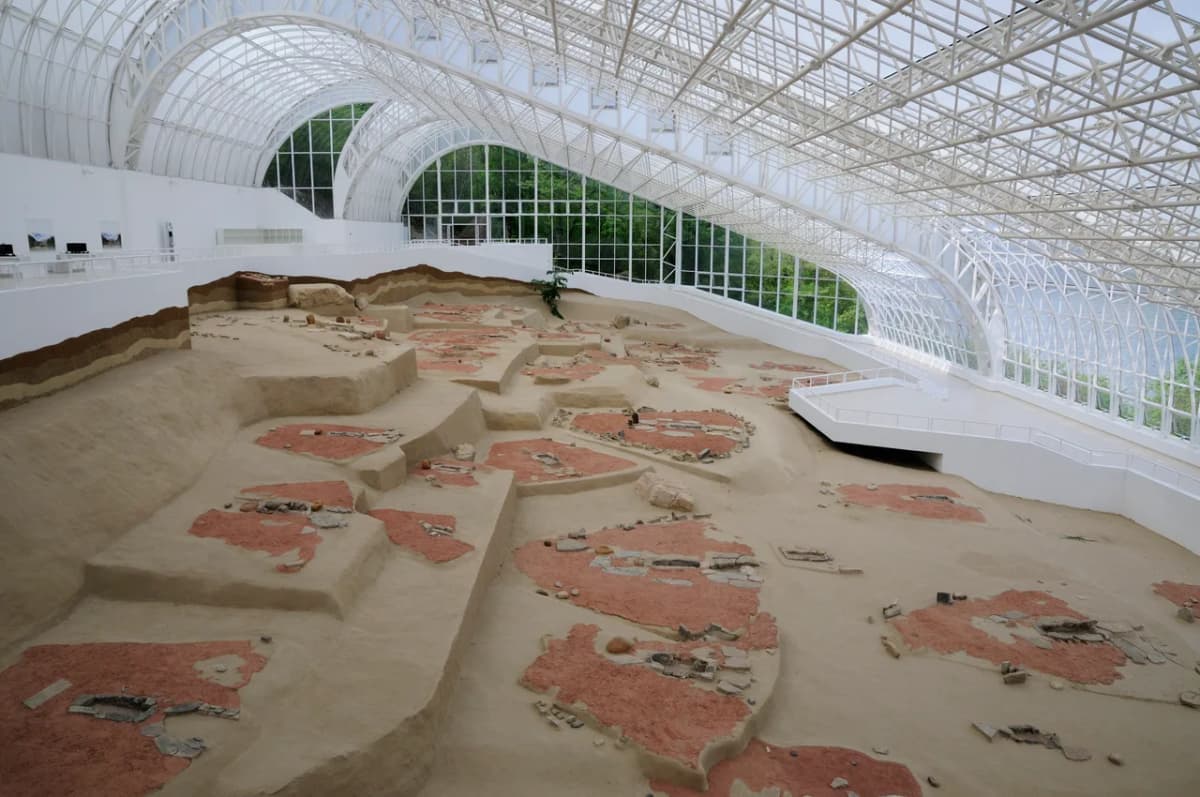 Fish-human sandstone sculptures and trapezoid house floors at Lepenski Vir, Serbia