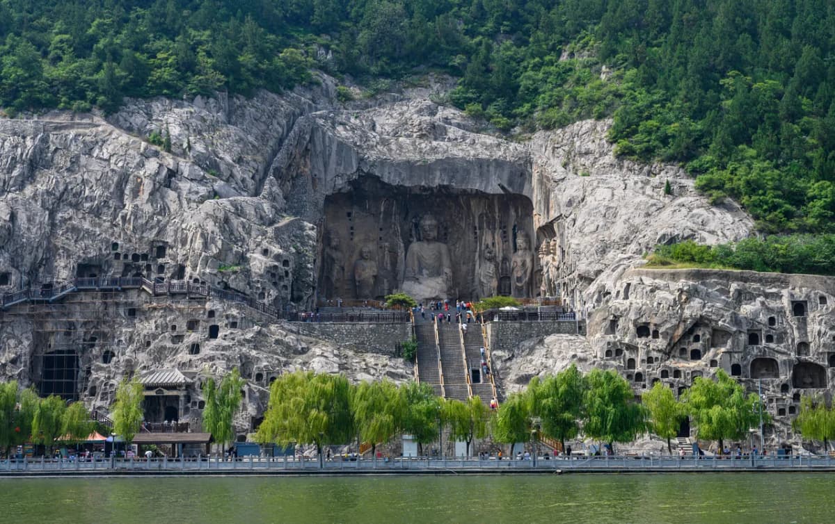 The colossal Vairocana Buddha of the Fengxian Temple at the Longmen Grottoes, Luoyang, China