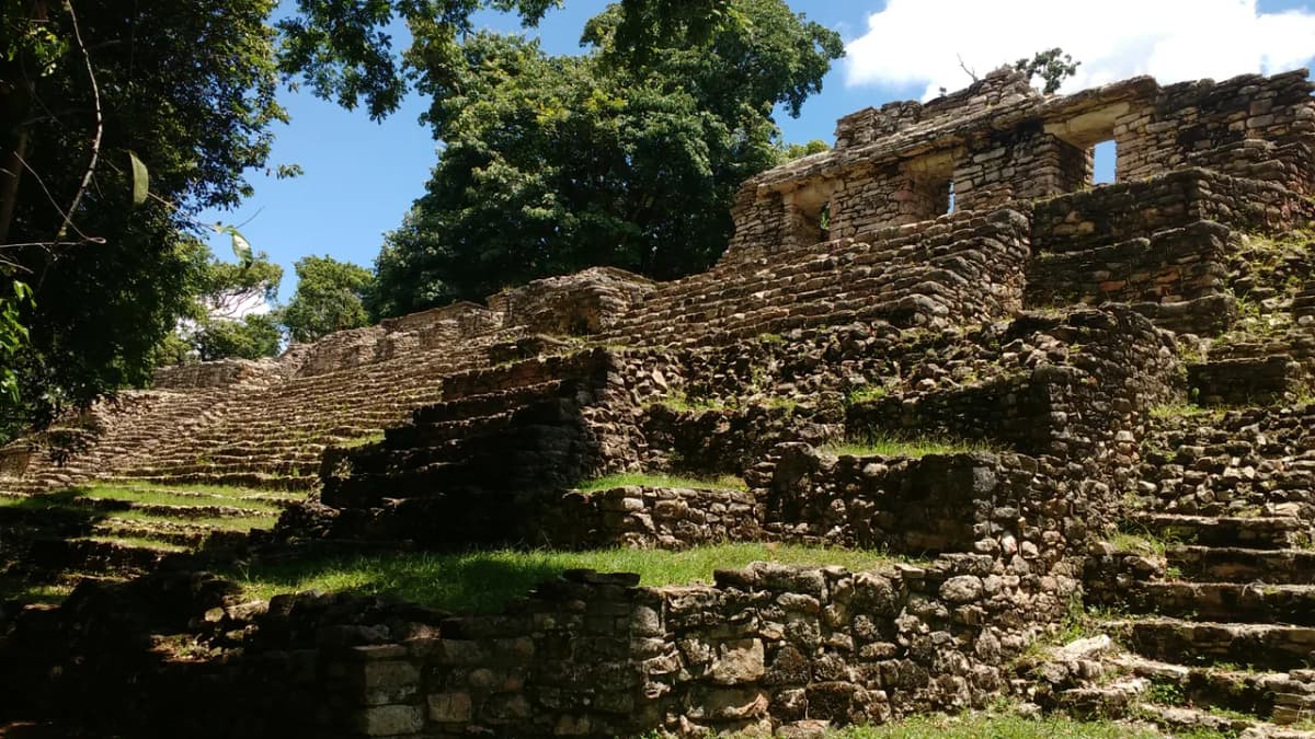 Temple 33 with roof comb rising above the jungle at Yaxchilan, Chiapas, Mexico