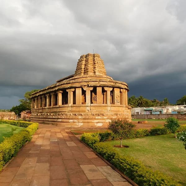 Apsidal Durga temple at Aihole, Karnataka, with peristyle and shikhara