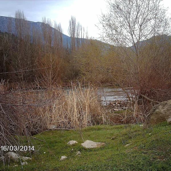 Sakarya Valley landscape near Bilecik, northwestern Türkiye, the river corridor below Gedikkaya Cave. Not a photograph of the cave mouth or the 2026 figurines.