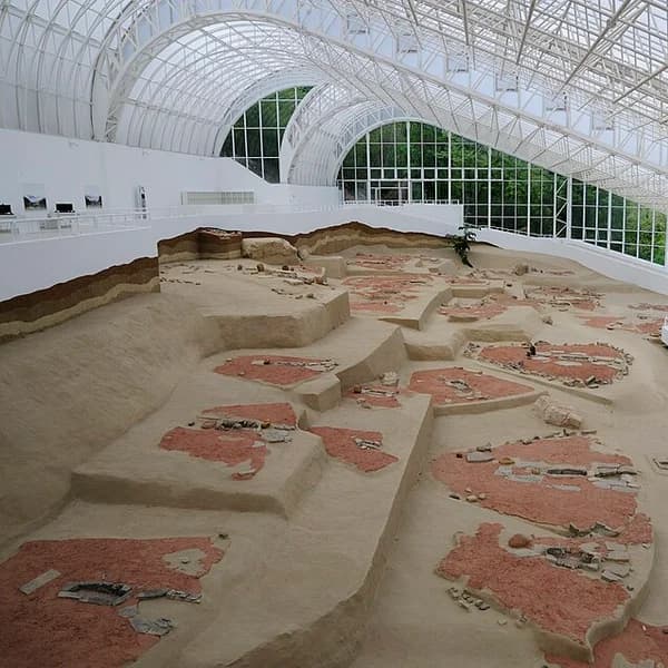 Fish-human sandstone sculptures and trapezoid house floors at Lepenski Vir, Serbia