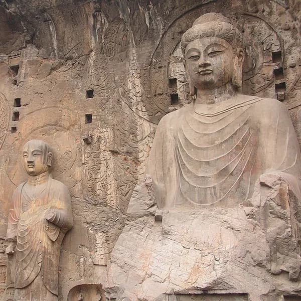 The colossal Vairocana Buddha of the Fengxian Temple at the Longmen Grottoes, Luoyang, China