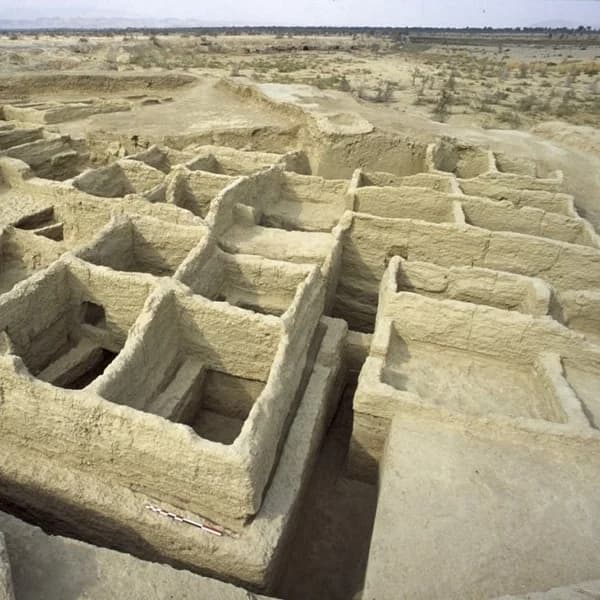 Eroded mudbrick ruins of Mehrgarh on the Kachi plain, Balochistan
