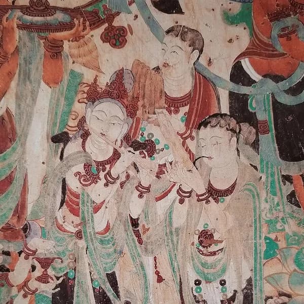 Cliff face of the Mogao Caves near Dunhuang, honeycombed with Buddhist cave temples carved over a thousand years