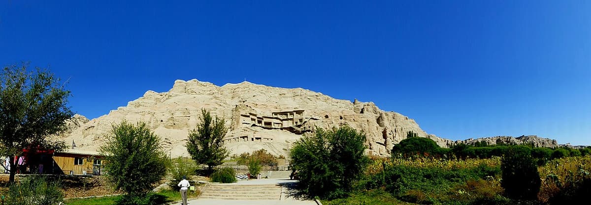 Cliff face and cave openings of the Kizil Buddhist grottoes, Xinjiang