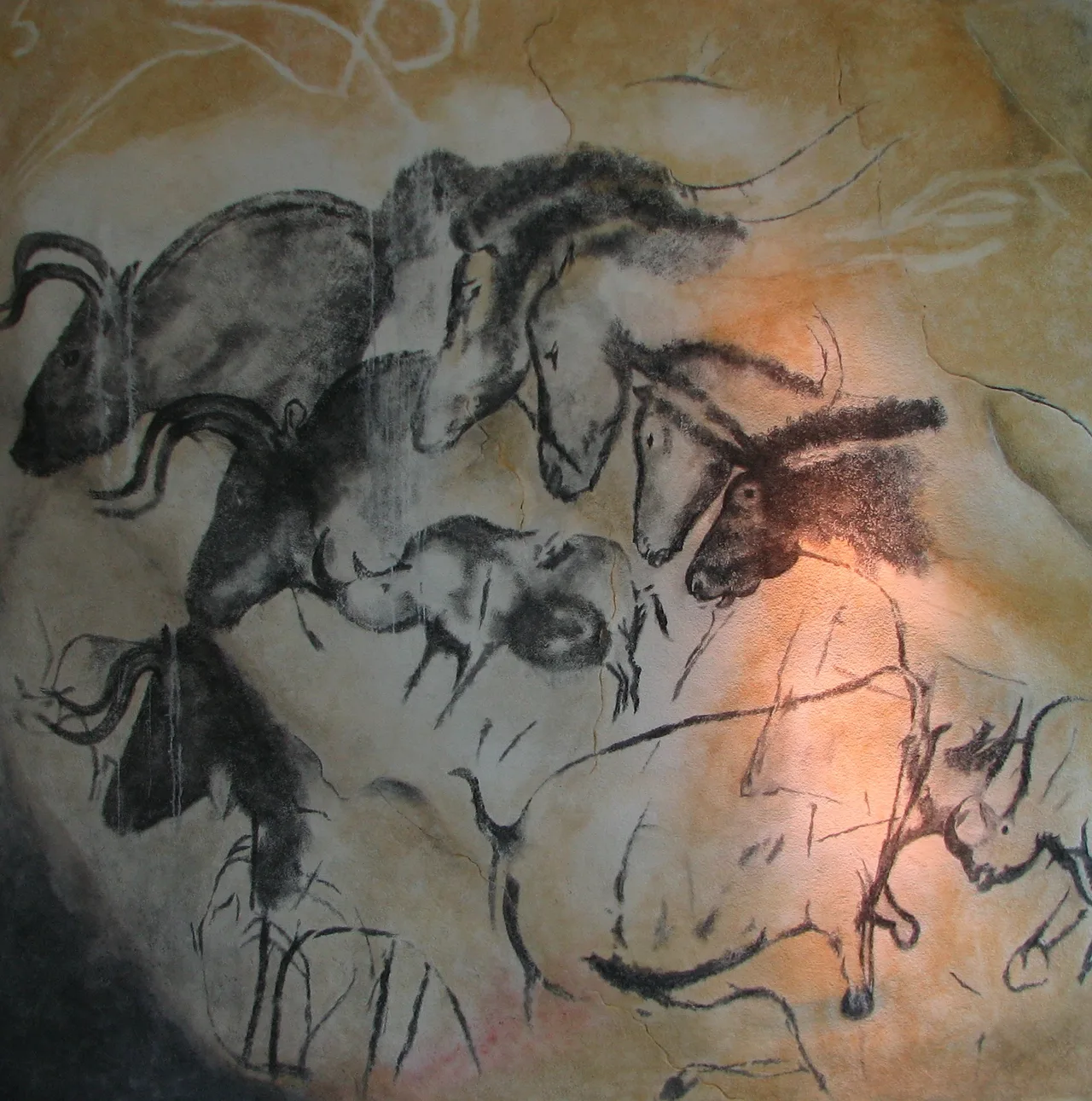 Prehistoric paintings of cave lions on the wall of Chauvet Cave, Ardèche, France, dated to c. 36,000 years ago