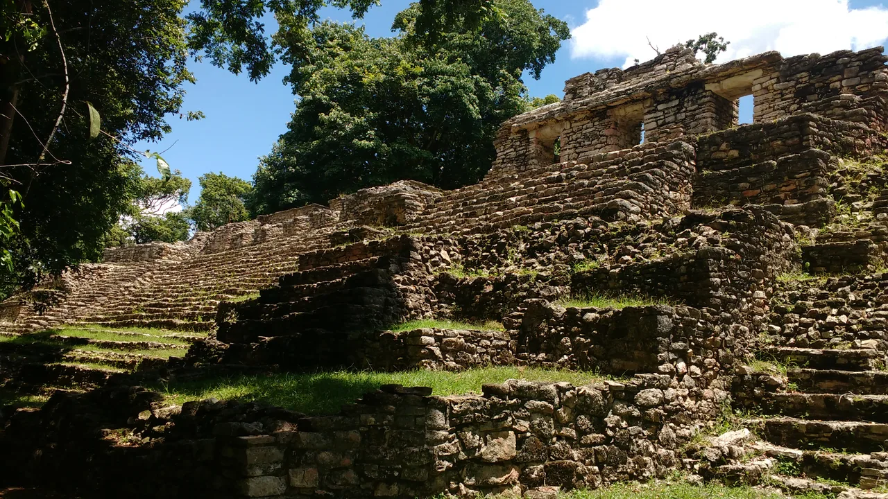 Temple 33 with roof comb rising above the jungle at Yaxchilan, Chiapas, Mexico