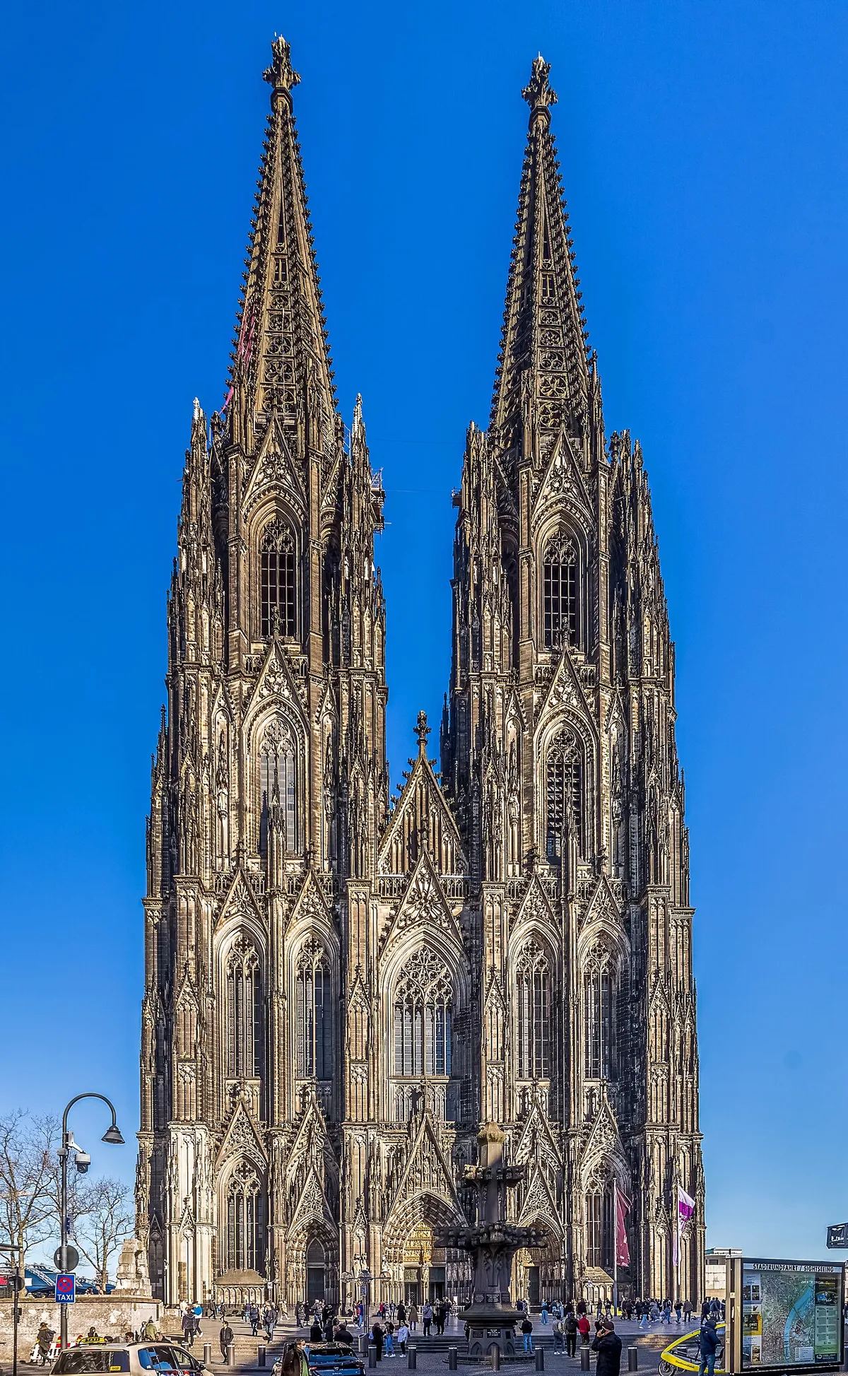 The twin Gothic spires and west façade of Cologne Cathedral, Germany