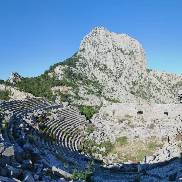 The theatre of Termessos perched high in the Taurus Mountains with clouds below